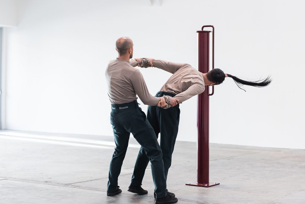 Adam Linder, Full Service, 2018; installation view, CCA Wattis Institute; "Choreographic Service No.2: Some Proximity," 2014, Duration variable, Two dancers: Enrico Ticconi and Adam Linder, Photo: Allie Foraker
